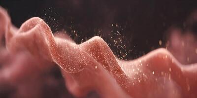 Abstract Red Glittering Particles Background Dusty Rose Swirling Waves Golden Dust Flowing Texture photo