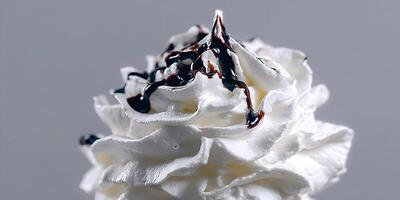 Closeup Whipped Cream with Chocolate Drizzle Dessert Topping Sweet Food Image photo