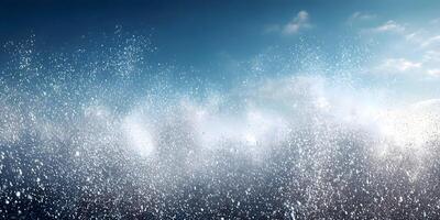 White Particles Exploding Against Blue Sky Background photo