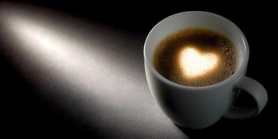 Coffee Cup Heart Shaped Foam Dark Background Closeup photo