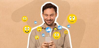 A man is joyfully texting on his smartphone, surrounded by vibrant emojis that depict happiness and engagement. He seems thrilled by the social media messages he is receiving. photo