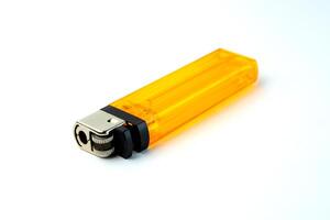 Yellow transparent plastic lighter with a metal ignition system. Refillable, compact, and easy to use. Ideal for everyday use, camping, kitchen, and emergency fire-starting needs. photo