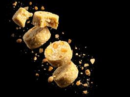 Tumbling Golden Spheres Known As Motichoor Ladoo photo
