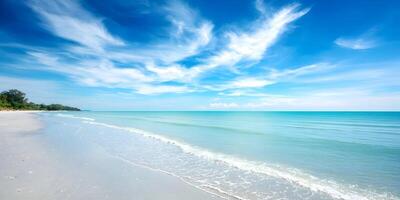 Tropical Beach Scene with Blue Ocean Waves and Sky photo