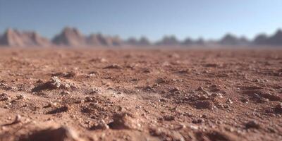 Closeup Red Desert Sand Ground Texture with Blurred Mountain Background photo