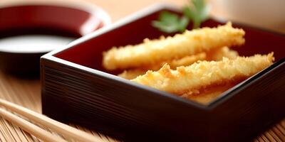 Crispy Fried Fish Tempura in Black Square Box with Soy Sauce photo