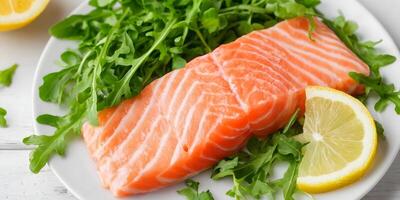 Raw Salmon Fillet with Arugula and Lemon photo