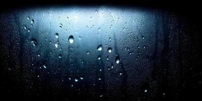 Dark Blue Window Glass with Water Droplets Condensation Rain Drops Texture Background photo