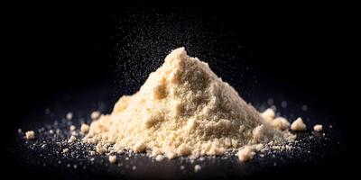 Pile of Almond Flour on Black Background Food Photography photo
