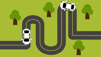 Scenic road winding through trees with a car driving along a hilly countryside, showing a peaceful and natural travel environment video