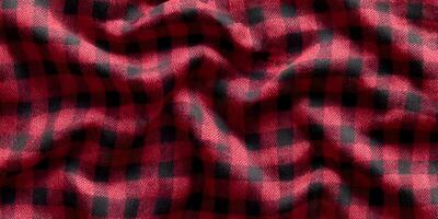 Red and Black Buffalo Plaid Fabric Texture Detailed Close Up Crumpled Gingham Pattern photo
