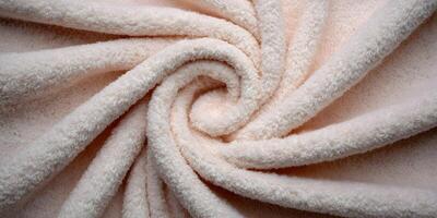 Soft Peach Colored Terrycloth Towel Fabric Swirled Texture photo