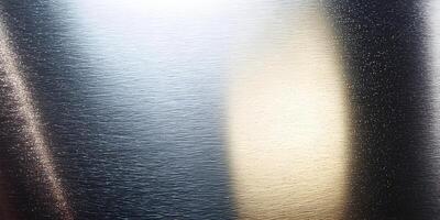 Textured Metal Surface with Light and Shadow Effects Dark and Light Grey Gradient Background photo