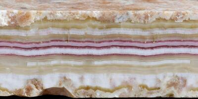 Layered Pink and White Onyx Cross Section Polished Slab Detailed Texture photo