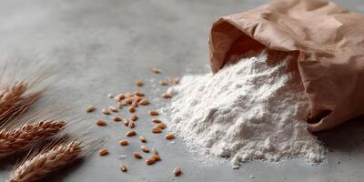 Wheat Flour in Brown Paper Bag with Wheat Ears photo