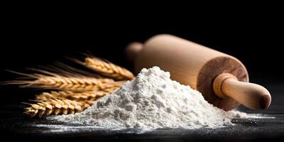 Pile of White Flour with Wheat and Rolling Pin Dark Background Baking Ingredients photo