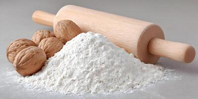 Wooden Rolling Pin Flour Pile Walnuts Baking Ingredients Still Life Photography photo