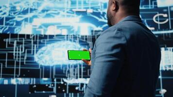 IT engineer in a high tech space uses copy space display with AI modern tools, artificial intelligence data structures and intelligent systems. Innovation and cybernetics for science. Camera A. video