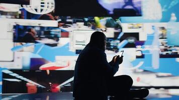 African american person deals with consequences of overusing social networks, faces stress and mental health due to digital dependence. Facing harmful toxic information overload. Camera A. video