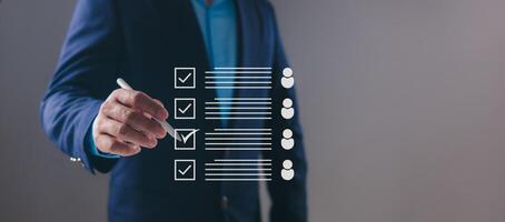 Recruitment, HR selection, candidate evaluation, human resources management, talent acquisition, professional staffing strategy, Manager using stylus to select employees on virtual checklist interface photo