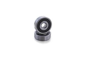 Two shiny metal bearings isolated on a white background include clipping path. photo