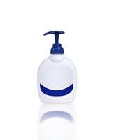 Hand Soap Dispenser, A white hand soap bottle with a blue pump top and a blue stripe on a blank white label include clipping path. photo