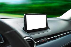 A blank white screen for text decoration of an in-car display unit on the dashboard while driving. photo