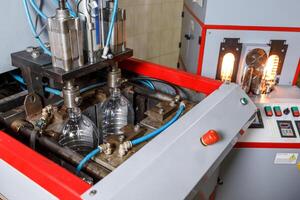 Plastic Bottle Production Line Blow Molding Machine with Automated Controls in Modern Industrial Factory photo