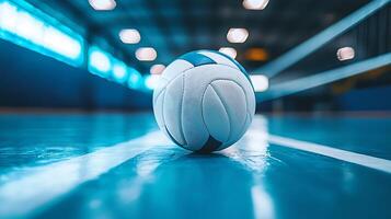 Volleyball on a Shiny Court with Blurred Lights. photo