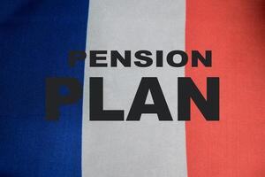 Pension plan concept with with French flag sign photo