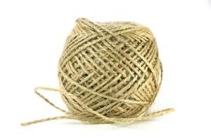 A skein of thread, twine for tying packaging. A ball of twine on a white background. photo