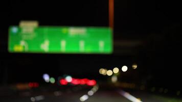 Blurred images of nighttime highway traffic video
