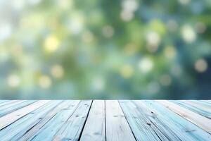 Light Blue Wooden Table Surface with Blurred Green Bokeh Background photo