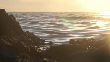 Majestic ocean sunset and wave splash, slow motion video