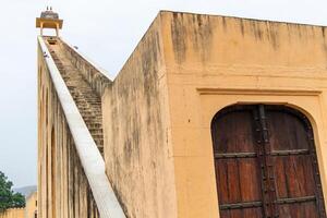Jantar Mantar giant sundial with stairs reaching the sky in Jaipur photo
