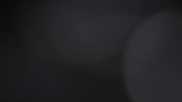 Multicolored light leaks 4k footage on black background. Lens studio flare leak burst overlays. Natural lighting lamp rays bokeh effect. For compositing over your footage, stylizing , transitions video