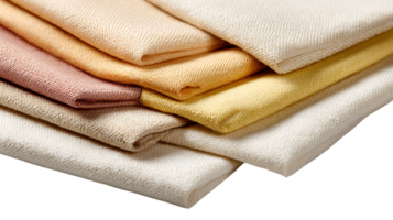 A stack of folded textured fabric swatches in various natural earth tones including cream beige and muted yellow isolated on transparent background png