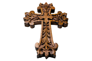 Intricately carved wooden cross with leaf detail. Light brown wood on transparent background. Depth and detail in the carving visible png
