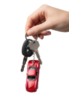 Hand holding car keys with red toy car isolated on transparent background, concept of ownership or investment metaphor png