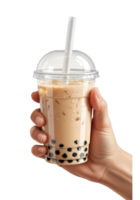 Hand holding cup of bubble tea with straw isolated on transparent background, boba drink with tapioca pearls png