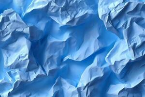 Crumpled Blue Paper Texture with Visible Wrinkles photo