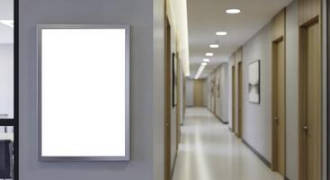 Blank vertical sign mockup in a modern office building corridor with a silver frame on a gray wall photo