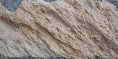 Beige Sand Stone Wall Texture Background Diagonal Lines Rough Surface photo