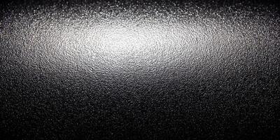 Dark Gray Textured Surface Illuminated Background photo