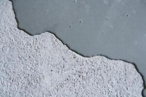 Concrete background. Self leveling compound spreading. photo