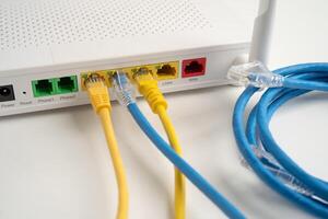 Ethernet cable wireless router connect to internet service provider network. photo