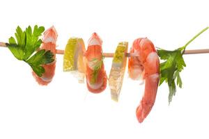 Boiled seafood shrimps with lemon isolated photo