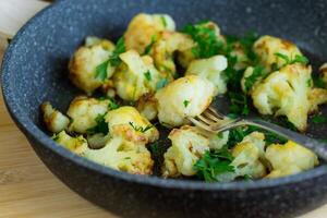 Rustic vegetable dish with cabbage and herbs photo