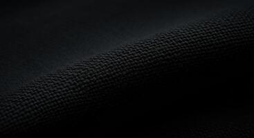 A black fabric with a dark background photo