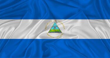 Flag of Nicaragua with cloth texture. Close up of Nicaraguan flag waving photo